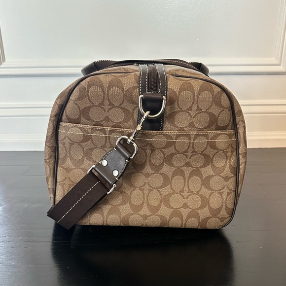 Coach Brown Signature Duffel Bag 
Like New
Minimal Wear and Tear - Picture 2 of 9